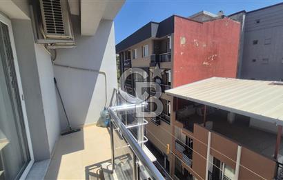 BUCA KURUÇEŞME DOĞUŞ CADDESİNDE EŞYALI BALKONLU ARAKAT SATILIK 2+1 DAİRE