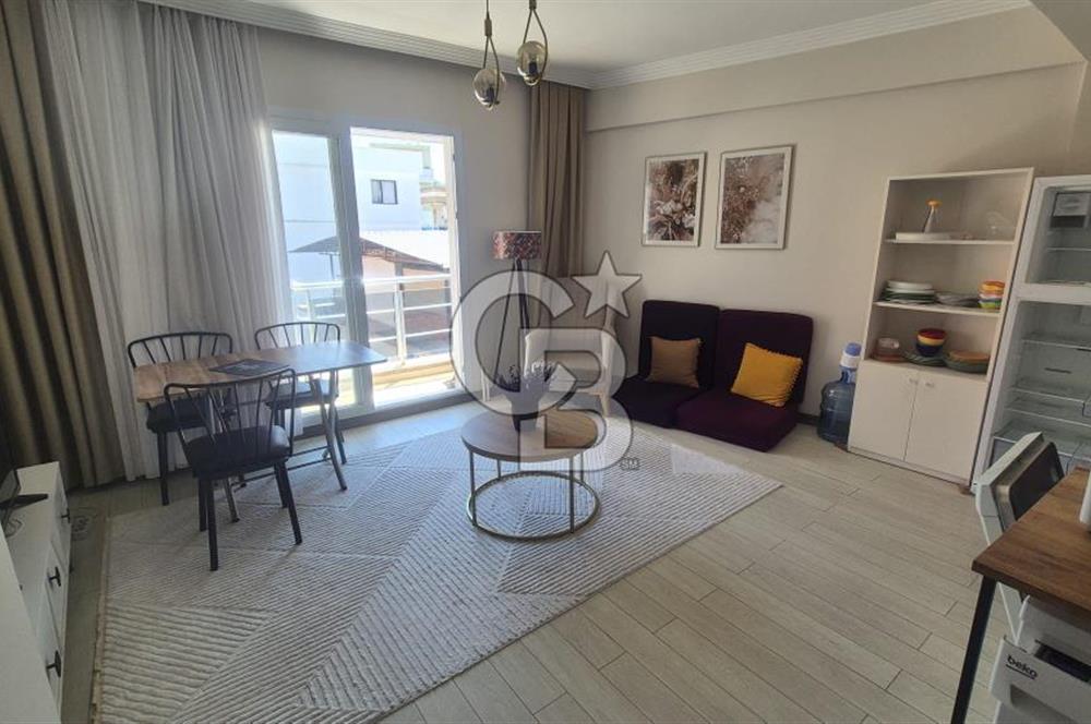 BUCA KURUÇEŞME DOĞUŞ CADDESİNDE EŞYALI BALKONLU ARAKAT SATILIK 2+1 DAİRE