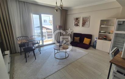 BUCA KURUÇEŞME DOĞUŞ CADDESİNDE EŞYALI BALKONLU ARAKAT SATILIK 2+1 DAİRE