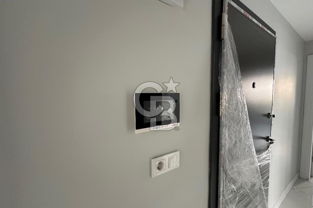 Ayvalık Ali Çetinkaya'da Kiralık Merkezi Sistem Daire