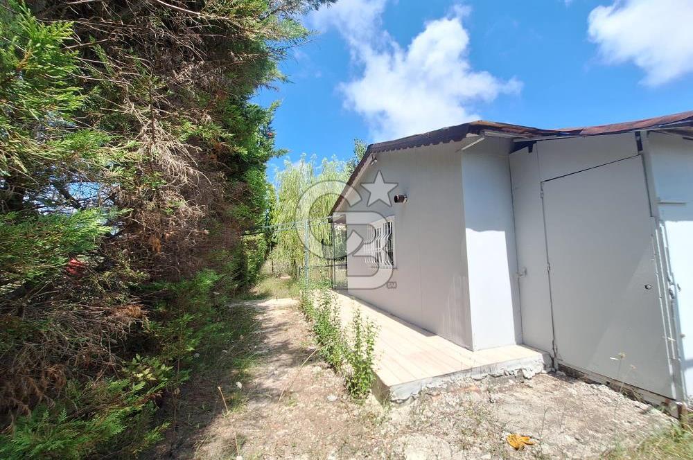 İÇİNDE RUHSATLI 56 M² EV OLAN 875 M² TARLA