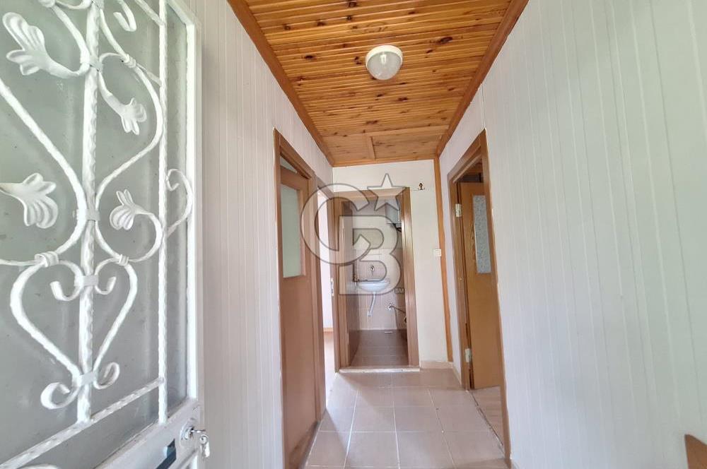 İÇİNDE RUHSATLI 56 M² EV OLAN 875 M² TARLA