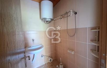 İÇİNDE RUHSATLI 56 M² EV OLAN 875 M² TARLA