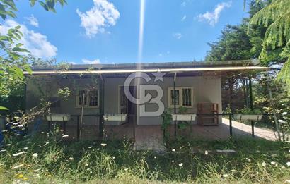 İÇİNDE RUHSATLI 56 M² EV OLAN 875 M² TARLA