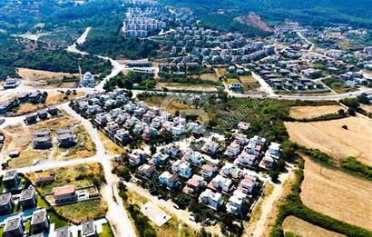 Kuşadası Güzelçamlı da satılık 7+1 triplex bahçeli yazlık