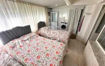 Kuşadası Güzelçamlı da satılık 7+1 triplex bahçeli yazlık
