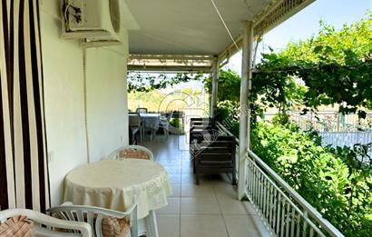 Kuşadası Güzelçamlı da satılık 7+1 triplex bahçeli yazlık