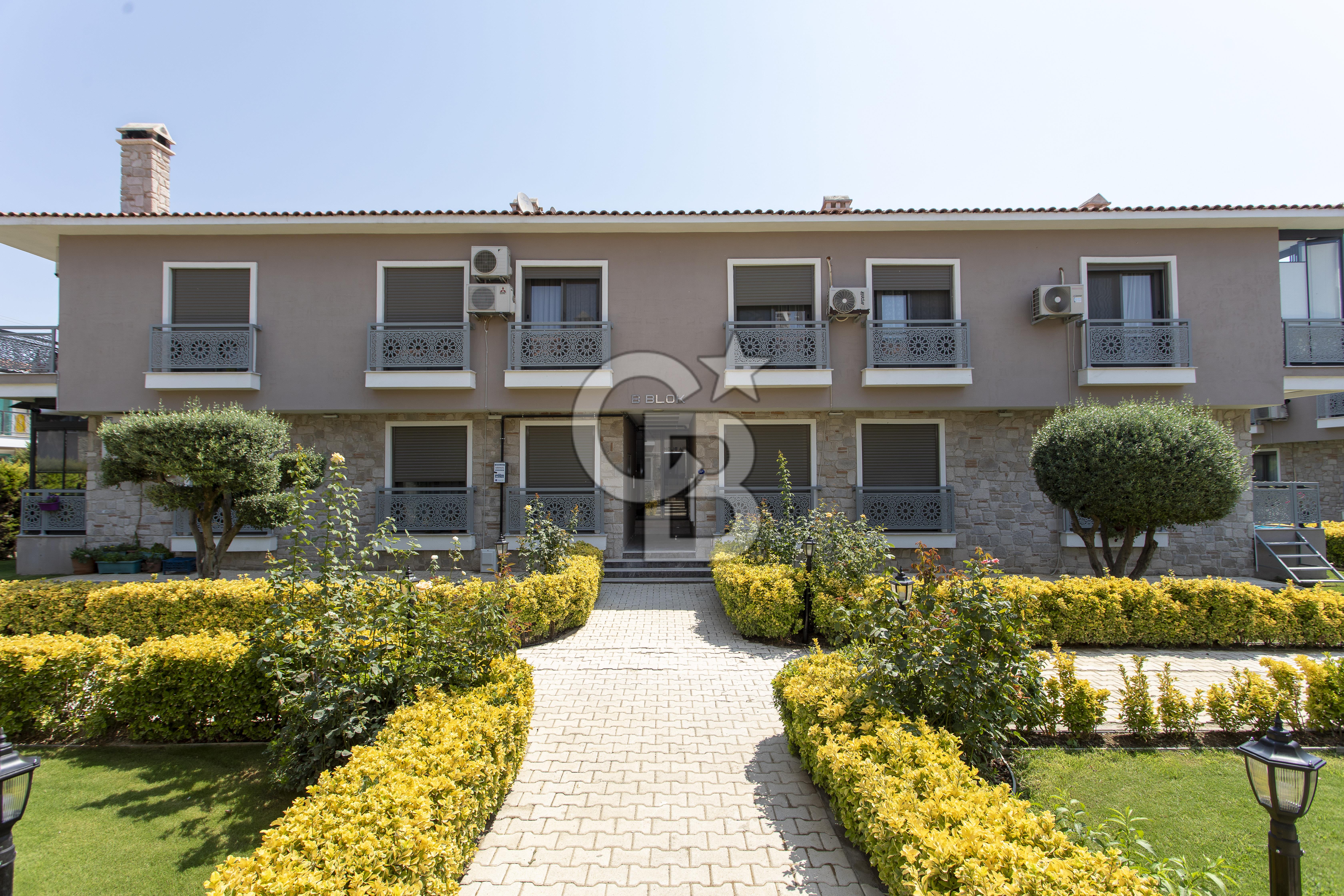 Foça Hacıveli Mah. Rüzgar Evleri Sitesi'nde Satılık 2+1 Daire