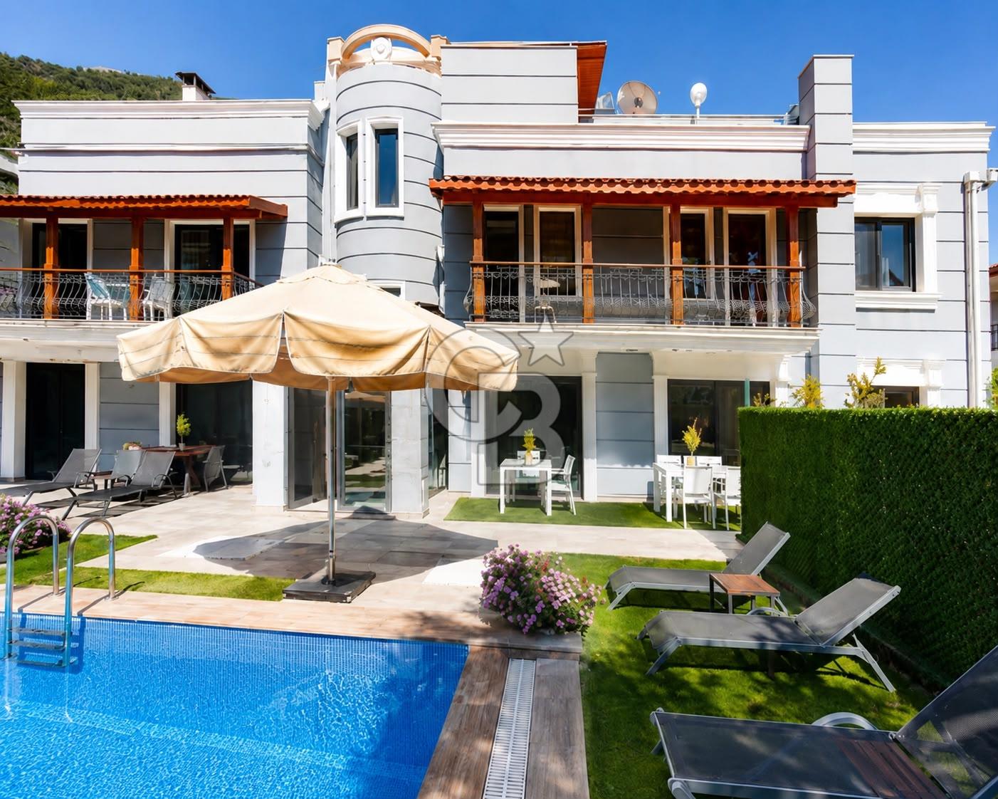 ANTALYA KAŞ KALKAN'DA OTEL KONSEPTİNDE SATILIK 1+1 DAİRE 
