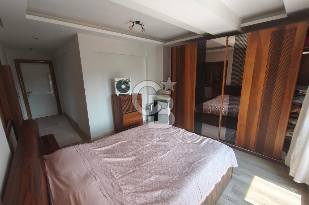 Karşıyaka Bostanlı'nın Kalbinde 2+1 Geniş ve Ferah Kiralık Daire