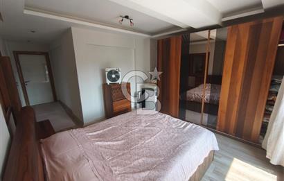 Karşıyaka Bostanlı'nın Kalbinde 2+1 Geniş ve Ferah Kiralık Daire