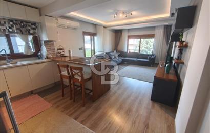 Karşıyaka Bostanlı'nın Kalbinde 2+1 Geniş ve Ferah Kiralık Daire
