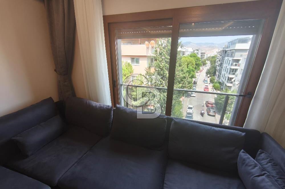 Karşıyaka Bostanlı'nın Kalbinde 2+1 Geniş ve Ferah Kiralık Daire
