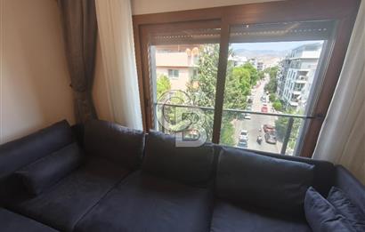 Karşıyaka Bostanlı'nın Kalbinde 2+1 Geniş ve Ferah Kiralık Daire