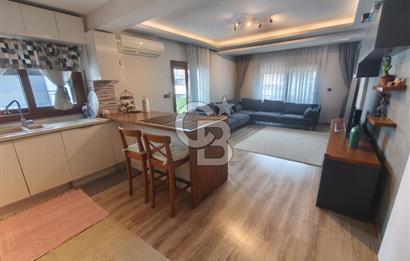 Karşıyaka Bostanlı'nın Kalbinde 2+1 Geniş ve Ferah Kiralık Daire