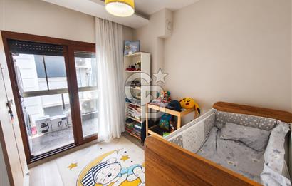 Karşıyaka Bostanlı'nın Kalbinde 2+1 Geniş ve Ferah Kiralık Daire