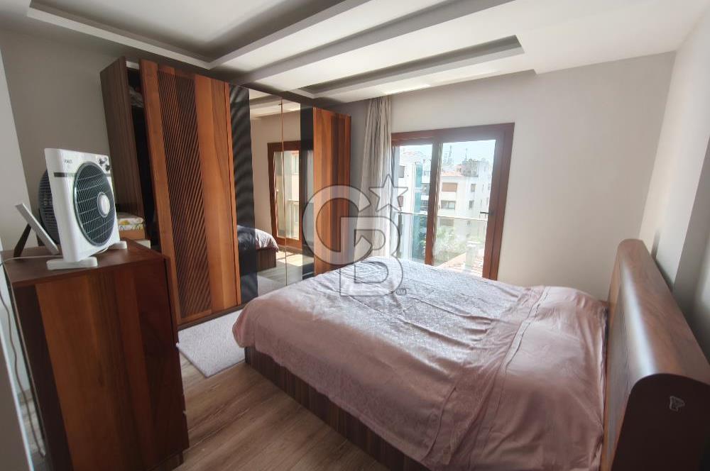 Karşıyaka Bostanlı'nın Kalbinde 2+1 Geniş ve Ferah Kiralık Daire