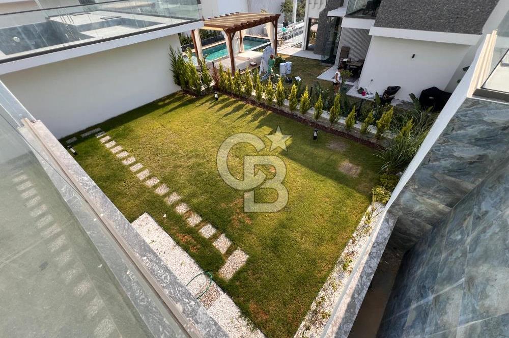 MUSELAND-KUŞADASI BAYRAKLIDEDE DE LÜKS 5+2 HAVUZLU VİLLA