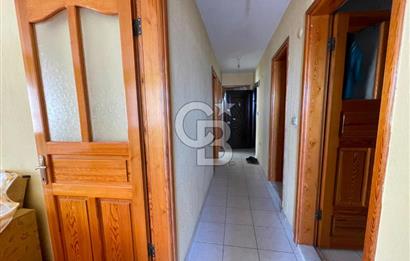 Bornova'da deniz ve şehir manzaralı merkezi konumda 3+1 satılık daire