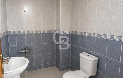 Bornova'da deniz ve şehir manzaralı merkezi konumda 3+1 satılık daire