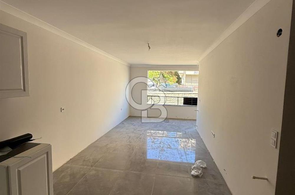 BAHÇEÇİK'DE ÖN CEPHE SIFIR 1+1 SATILIK DAİRE