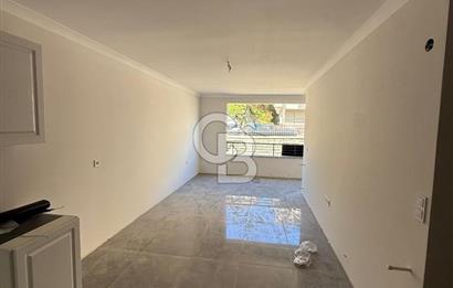 BAHÇEÇİK'DE ÖN CEPHE SIFIR 1+1 SATILIK DAİRE