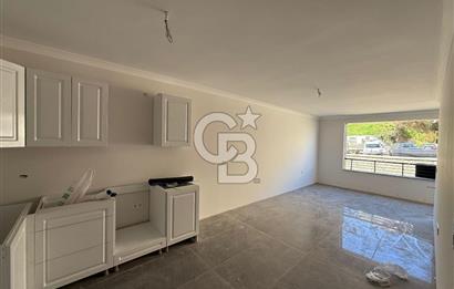 BAHÇEÇİK'DE ÖN CEPHE SIFIR 1+1 SATILIK DAİRE