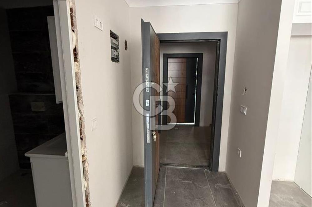 BAHÇEÇİK'DE ÖN CEPHE SIFIR 1+1 SATILIK DAİRE