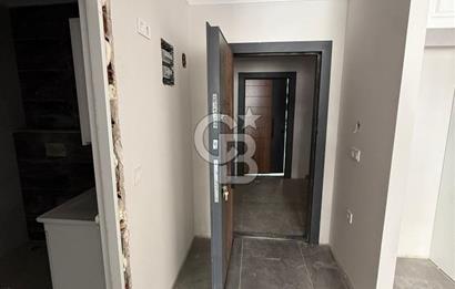 BAHÇEÇİK'DE ÖN CEPHE SIFIR 1+1 SATILIK DAİRE