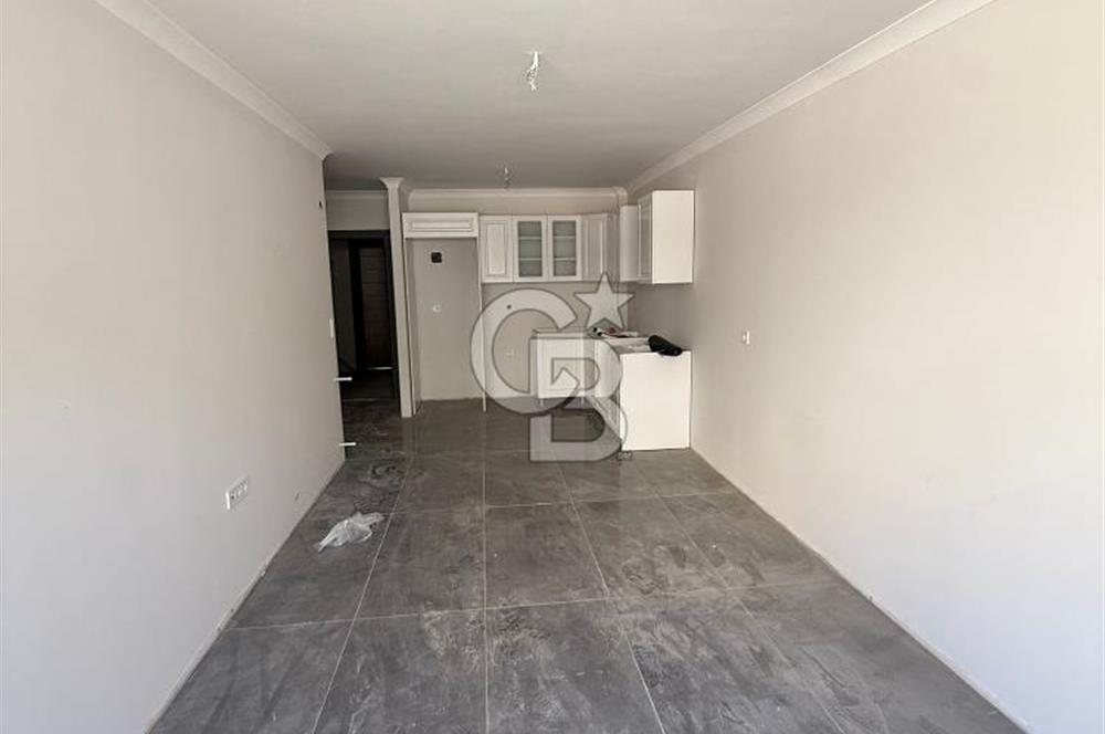 BAHÇEÇİK'DE ÖN CEPHE SIFIR 1+1 SATILIK DAİRE