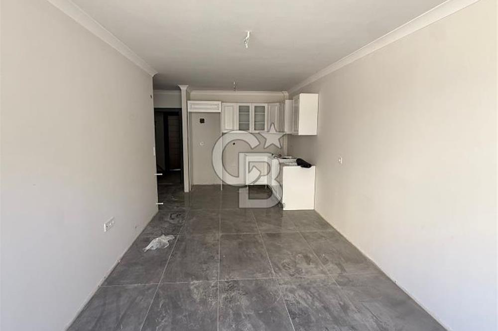 BAHÇEÇİK'DE ÖN CEPHE SIFIR 1+1 SATILIK DAİRE