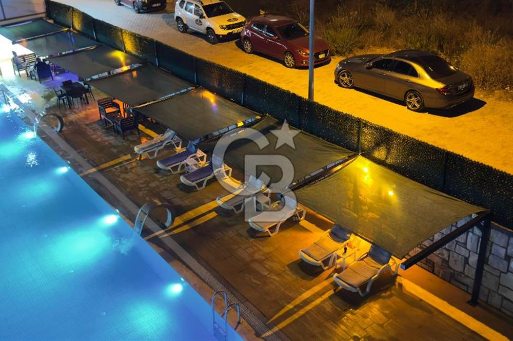 Asansörlü Havuzlu Ön cephe ara kat 6 yaşında 2+1 Daire