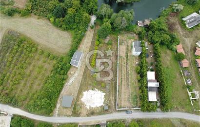 Şile Kurfallı'da Dere Kenarında 1.448 m² Tarla Yol-Su-Elektrik
