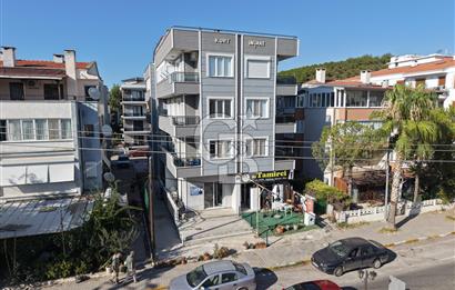 AYVALIK SARIMSAKLININ TAM MERKEZİNDE, HEM EV HEM DÜKKANI 2+1