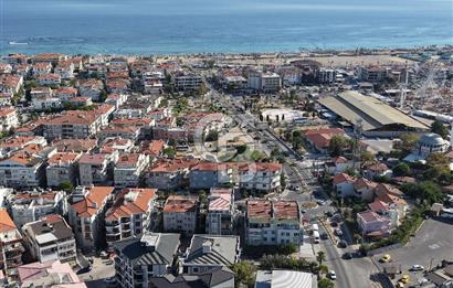 AYVALIK SARIMSAKLININ TAM MERKEZİNDE, HEM EV HEM DÜKKANI 2+1