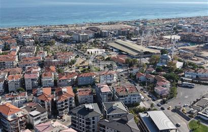 AYVALIK SARIMSAKLININ TAM MERKEZİNDE, HEM EV HEM DÜKKANI 2+1