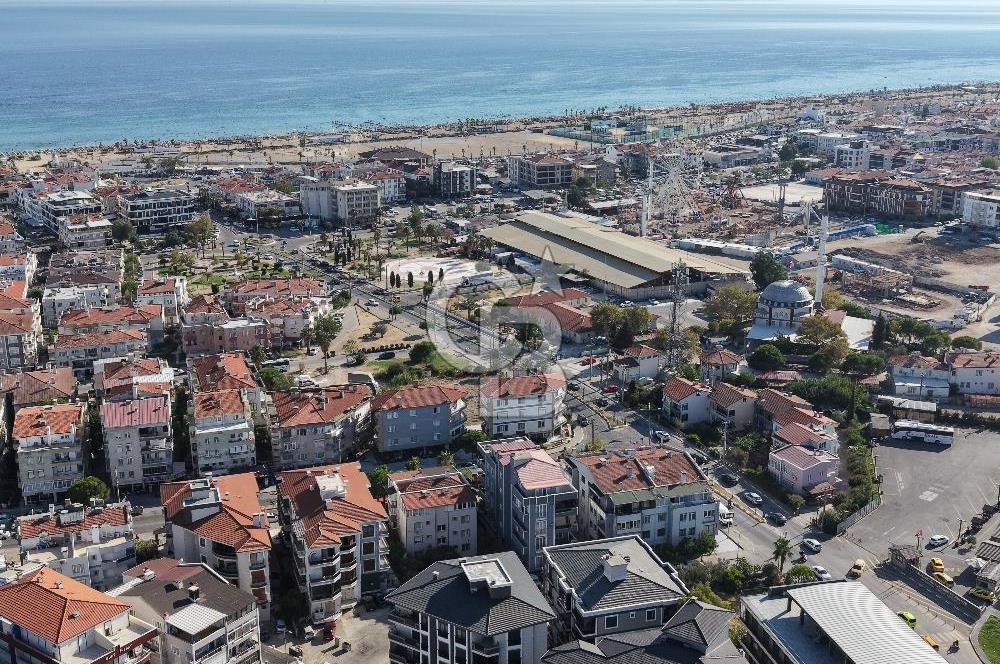 AYVALIK SARIMSAKLININ TAM MERKEZİNDE, HEM EV HEM DÜKKANI 2+1