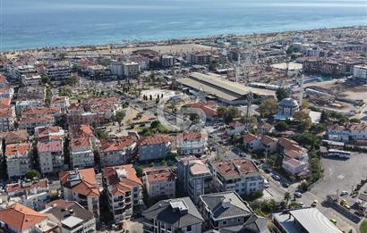 AYVALIK SARIMSAKLININ TAM MERKEZİNDE, HEM EV HEM DÜKKANI 2+1