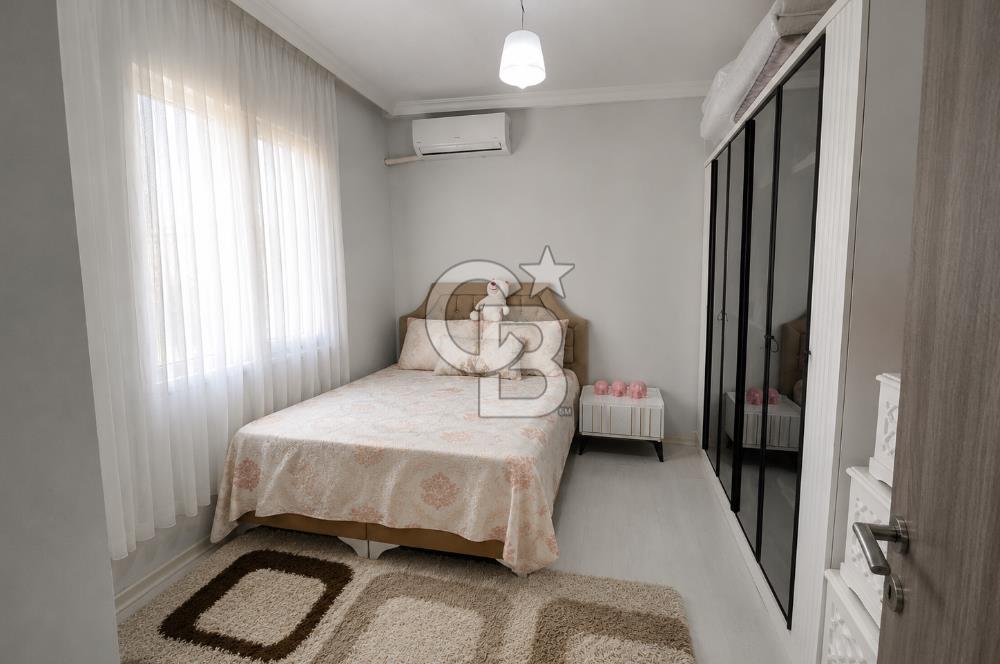 AYVALIK SARIMSAKLININ TAM MERKEZİNDE, HEM EV HEM DÜKKANI 2+1