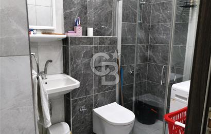 AYVALIK SARIMSAKLININ TAM MERKEZİNDE, HEM EV HEM DÜKKANI 2+1