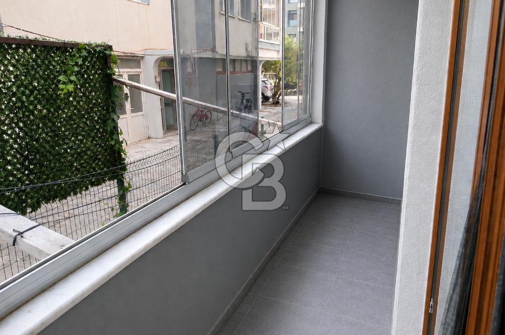 AYVALIK SARIMSAKLININ TAM MERKEZİNDE, HEM EV HEM DÜKKANI 2+1