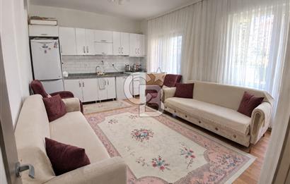 AYVALIK SARIMSAKLININ TAM MERKEZİNDE, HEM EV HEM DÜKKANI 2+1