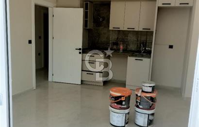 Didim Mavişehirde lüks sitede satılık 2+1 açık mutfak daire