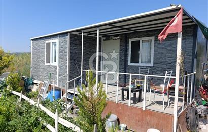 ALİAĞA BARBAROS'TA EVİ VE HOBİ BAHÇESİ BULUNAN SATILIK TARLA 