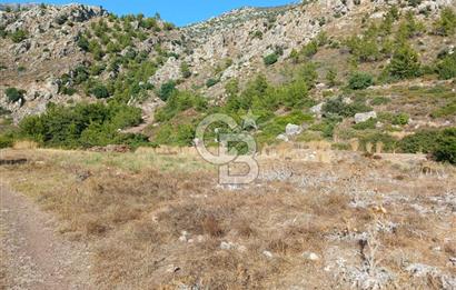 MARMARİS ORHANİYE KIZKUMUNDA PANORAMİK DENİZ MANZARALI ARSA