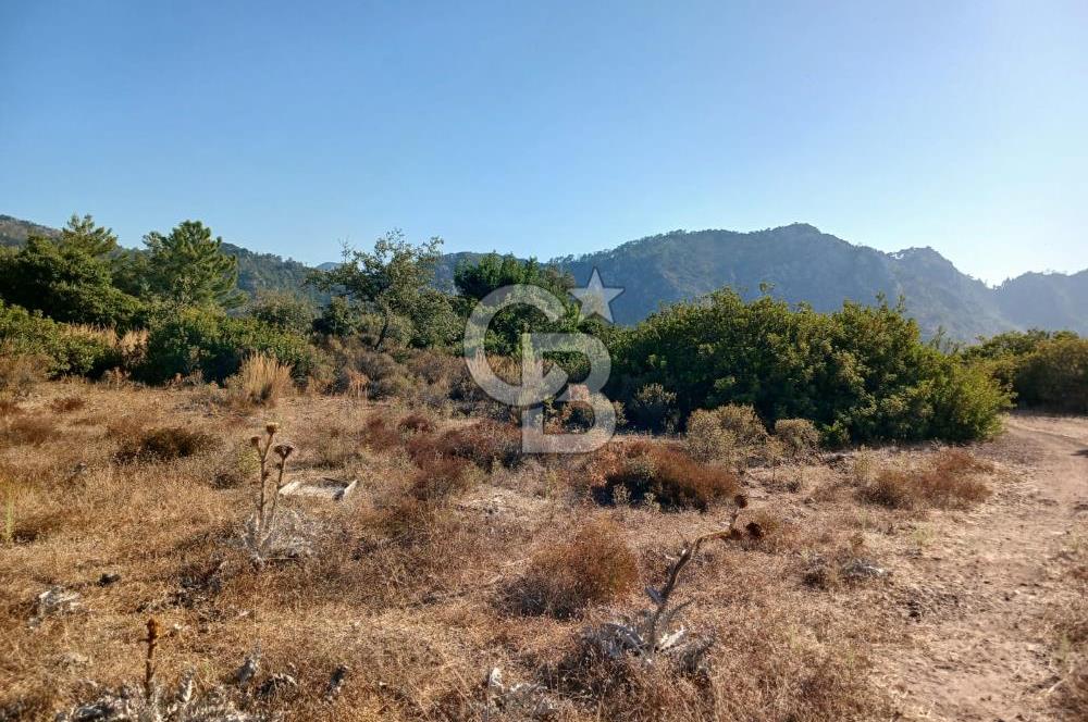 MARMARİS ORHANİYE KIZKUMUNDA PANORAMİK DENİZ MANZARALI ARSA