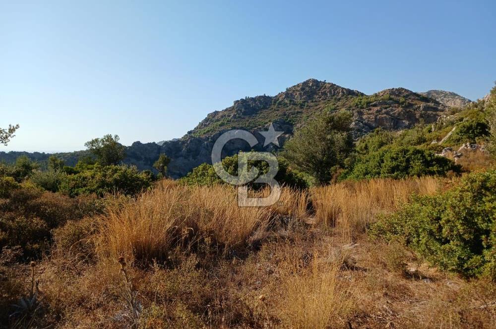 MARMARİS ORHANİYE KIZKUMUNDA PANORAMİK DENİZ MANZARALI ARSA