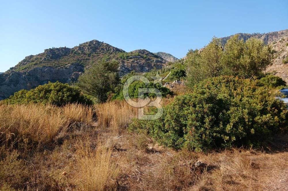 MARMARİS ORHANİYE KIZKUMUNDA PANORAMİK DENİZ MANZARALI ARSA