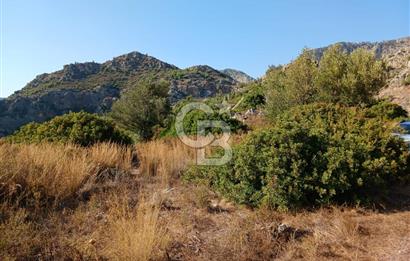 MARMARİS ORHANİYE KIZKUMUNDA PANORAMİK DENİZ MANZARALI ARSA