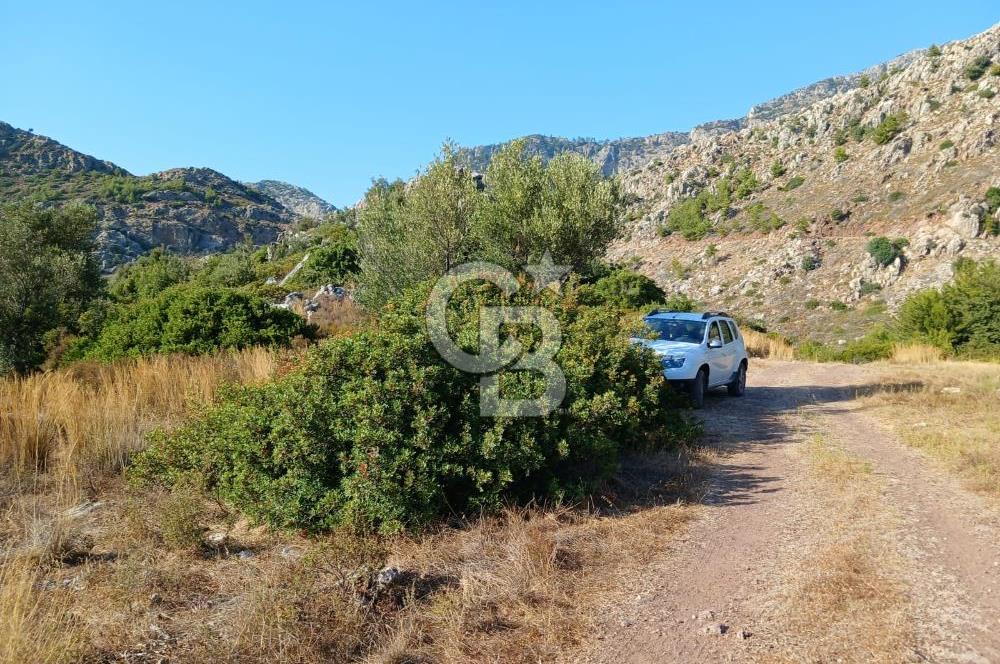 MARMARİS ORHANİYE KIZKUMUNDA PANORAMİK DENİZ MANZARALI ARSA